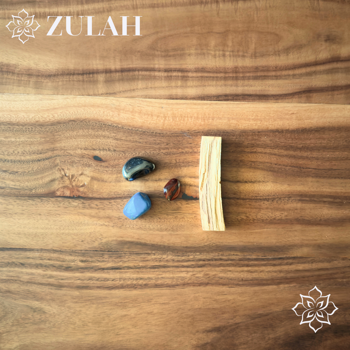 Single palo santo stick from Peru on a wood board